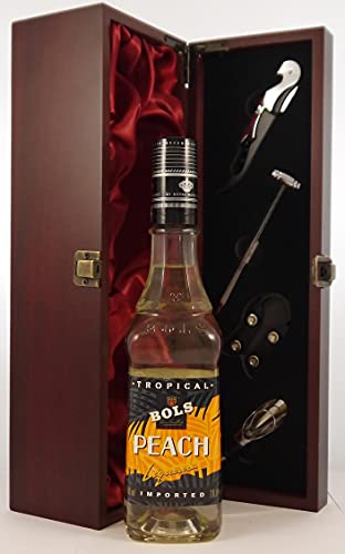 Bols Peach Liqueur (50cls) 1980's in einer mit Seide ausgestatetten Geschenkbox, da zu 4 Weinaccessoires, 1 x 500ml von Bols Peach Liqueur