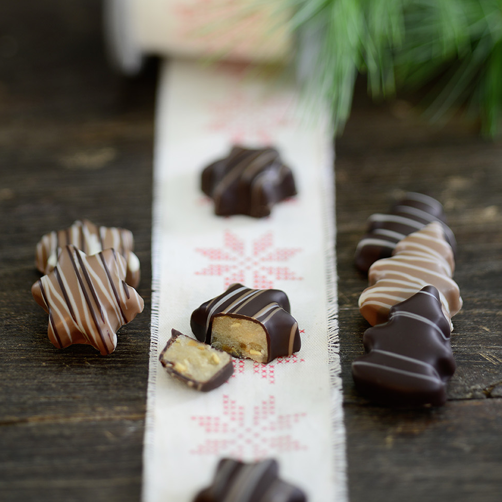 Display Weihnachtspraline Stern und Baum in Cello von Confiserie Burg Lauenstein GmbH