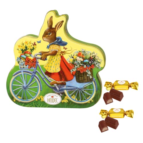 Heidel | Metalldose Hase Osterfahrrad | Milchschokolade mit Sahnefüllung | Geschenkbox mit Pralinen aus Milchschokolade von Confiserie Heidel