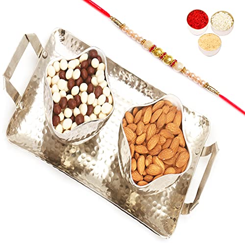 Ghasitaram Gifts Rakhi Gifts for Brothers Silver Aluminium Nutties and Almonds Tray with Pearl Rakhi von Ghasitaram Gifts