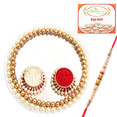 Ghasitaram Gifts Rakhi Gifts for Brothers White Pearl Pooja Thali with Pearl Rakhi with 200 GMS of Kaju katli von Ghasitaram Gifts