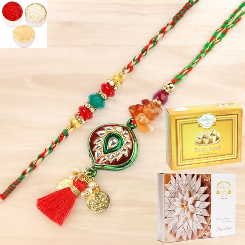 Ghasitaram Gifts Rakhi for Brother Rakhis Online - RM-217 Bhaiya Bhabhi rakhi with 200 gms of Kaju katli and 200 gms of Soan Papdi von Ghasitaram Gifts