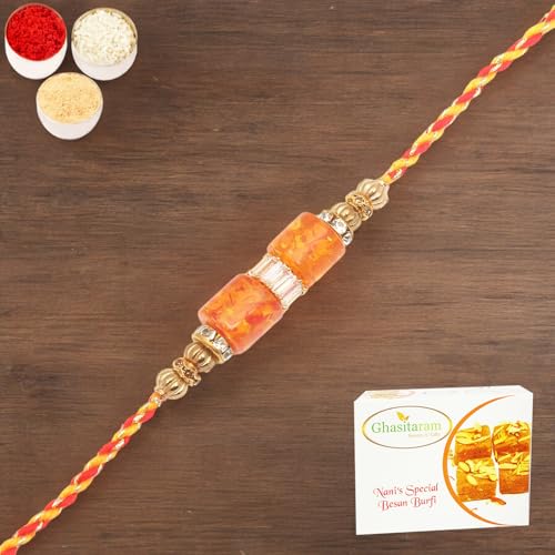 Ghasitaram Gifts Rakhi for Brother Rakhis Online - RM598 - Orange Stone Bracelet Rakhi with 400 gms of Besan Barfi von Ghasitaram Gifts