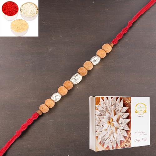 Ghasitaram Gifts Rakhi for Brother Rakhis Online - Rs-107 Rakhi Thread with 200 gms of Kaju katli von Ghasitaram Gifts