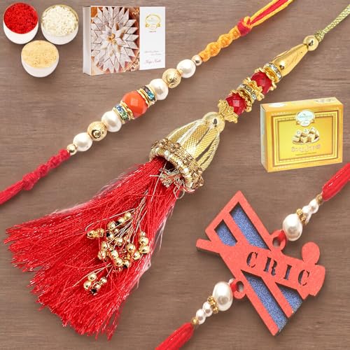 Ghasitaram Gifts Rakhi for Brother Rakhis Online - Set of 3 Golden Ibiza Bhaiya Bhabhi Rakhi and Cricketer Kids Rakhi with 200 gms of Kaju katli and 200 gms of Soan Papdi von Ghasitaram Gifts