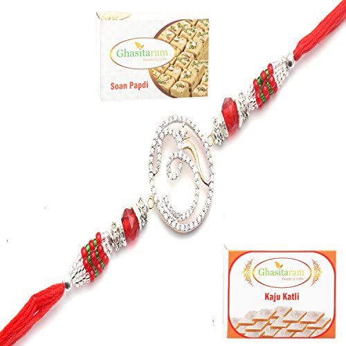 Ghasitaram Gifts Rakhi for Brother Rakhis Online - The Divine Grace of Om Diamond Rakhi with 200 gms of Kaju katli and 200 gms of Soan Papdi von Ghasitaram Gifts