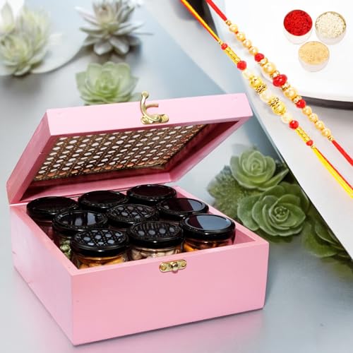 Ghasitaram Gifts Jaiccha Rakhi Gifts for Brothers Pink Cane Rattan Box of 9 Dryfruit Jars with 2 rakhis von Jaiccha