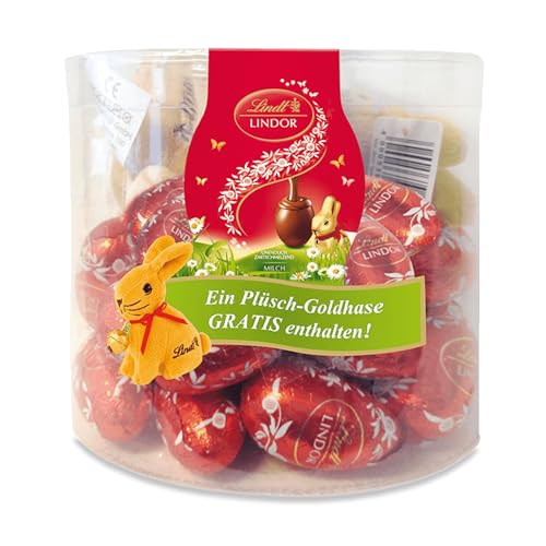 Lindt Schokolade LINDOR-Eier Vollmilch | 450 g Paket | ca. 25 x LINDOR Vollmilch-Schokolade mit zartschmelzender Füllung und ein kuschliger Plüsch-Osterhase | Osterschokolade | Schokoladengeschenk von Lindt & Sprüngli