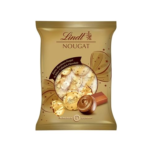 Lindt Schokolade Nougat Doppeldreh Kugeln | 101g | Zarte Haselnuss-Nougatcrème in Vollmilch Schokolade | Schokoladengeschenk zu Weihnachten | Weihnachtsschokolade von Lindt & Sprüngli