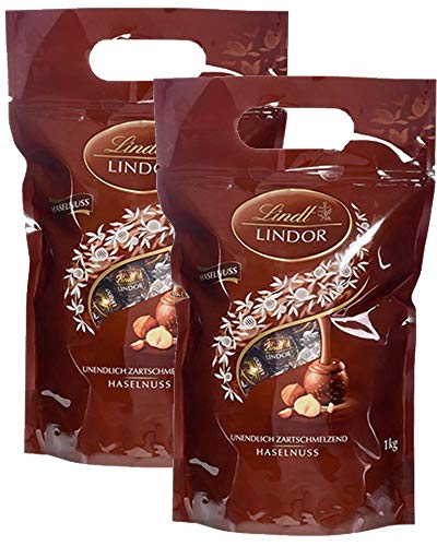 Lindt LINDOR Schokoladen Kugeln Haselnuss | 1 kg Beutel, wiederverschließbar | ca. 80 Schokoladen Kugeln Haselnuss-Milch-Schokolade | Großpackung, Pralinen-Geschenk, Schokoladengeschenk (2 x 1 kg) von Lindt