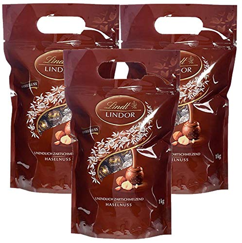 Lindt LINDOR Schokoladen Kugeln Haselnuss | 1 kg Beutel, wiederverschließbar | ca. 80 Schokoladen Kugeln Haselnuss-Milch-Schokolade | Großpackung, Pralinen-Geschenk, Schokoladengeschenk (3 x 1 kg) von Lindt