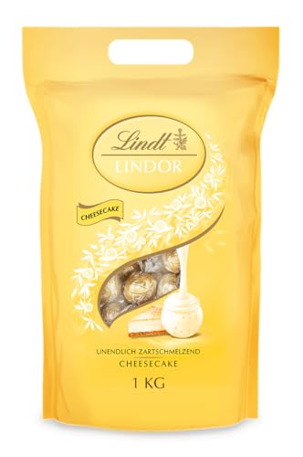 Lindt Schokolade LINDOR Kugeln Cheesecake | 1kg Beutel, wiederverschließbar | 80 Kugeln weiße Schokolade mit zartschmelzender Cheesecake-Füllung | Pralinen-Geschenk | Schokoladen-Geschenk von Lindt