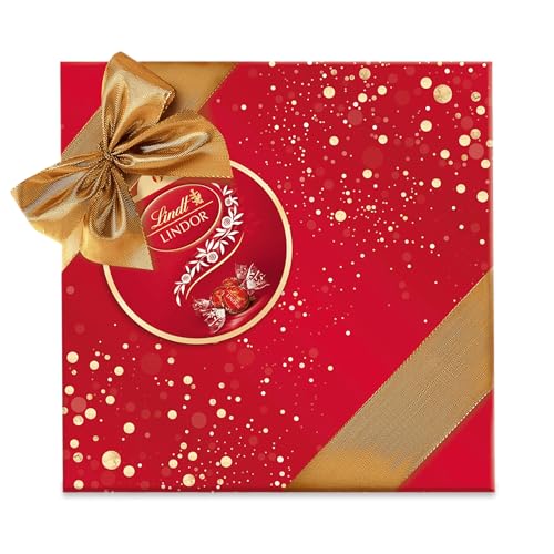 Lindt Schokolade LINDOR Präsent im Geschenkpapier Milch | 375g | LINDOR Milch Kugeln mit unendlich zartschmelzender Füllung | Schokoladengeschenk | Pralinengeschenk von Lindt