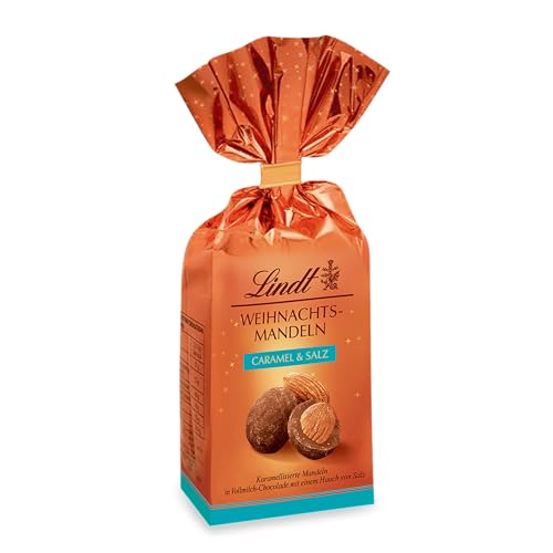 Lindt Schokolade Weihnachts-Mandeln Caramel & Salz | 100 g Beutel | Mandeln in Vollmilch Schokolade mit einem Hauch von Salz sowie Zimt und Koriander | Schokoladen-Geschenk zu Weihnachten von Lindt